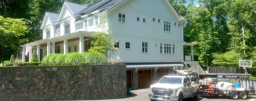 Attractive home exterior in Midlothian VA with Alpha Exteriors Truck