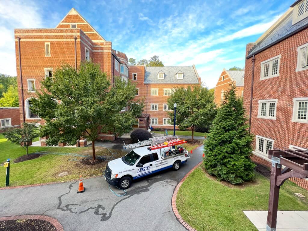 alpha exterior solutions preforming commercial building washing and exterior cleaning