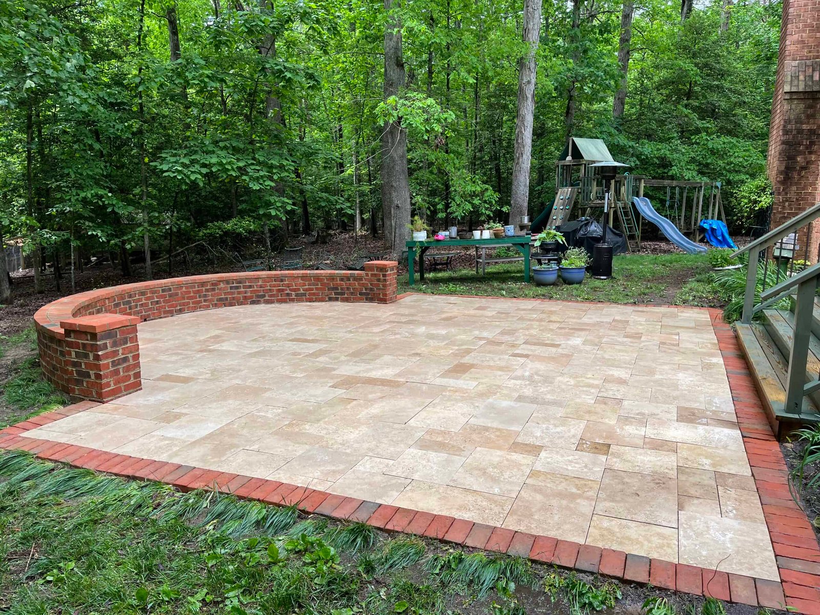 gorgeous outdoor brick and paver patio after pressure washing and paver sealing near ashland virginia