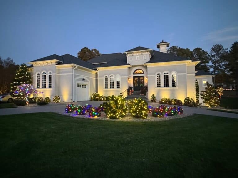 Residential home with christmas light landscape display installed and maintained by alpha exterior solutions in bon air VA