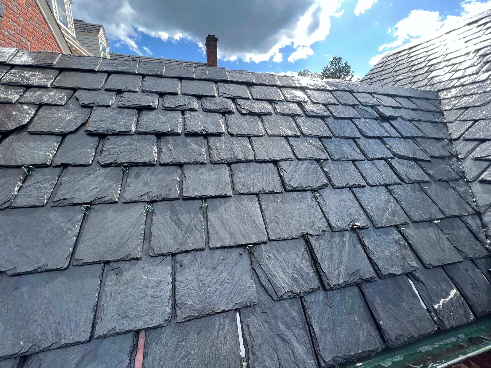 cedar roof after professional roof cleaning and soft washing by alpha exterior solutions