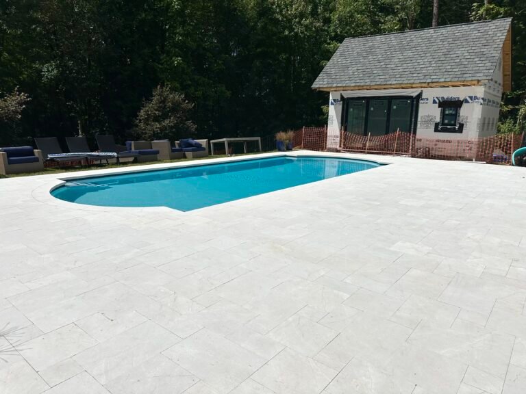 residential paver pool deck after professional cleaning and paver sealing by alpha exterior solutions