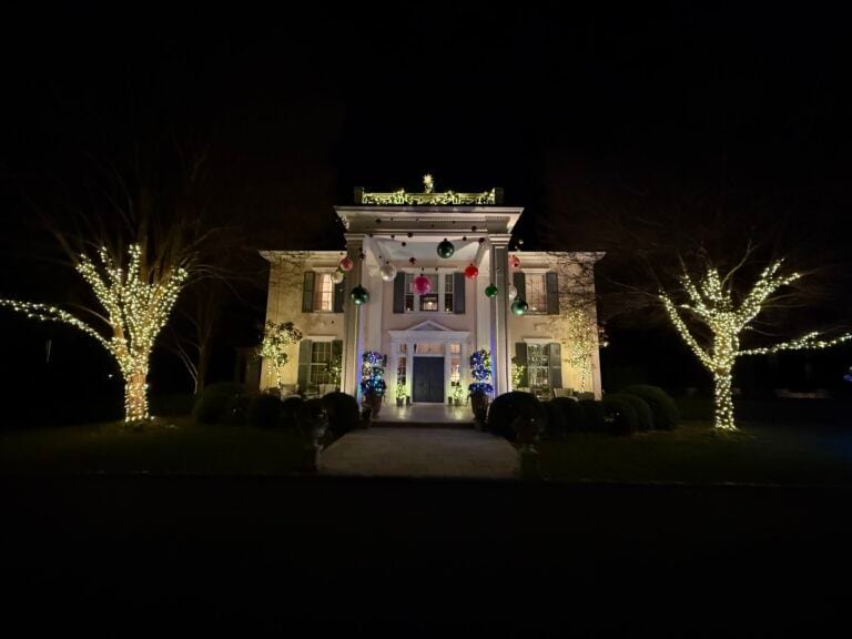 Large antebellum home beautifully decorated for the Christmas holiday season by alpha exterior solutions near Richmond