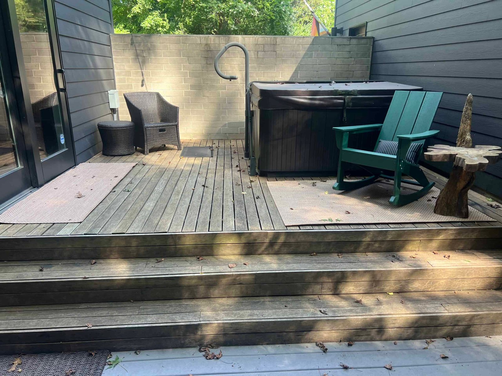 aged residential wooden deck patio before soft washing and staining by alpha exterior services
