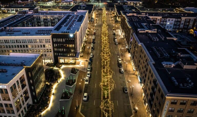 commercial city scape beautifully lit with christmas lights for the holiday season by alpha holiday lighting and exterior solutions