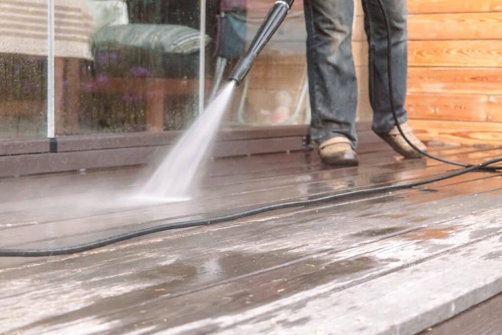 Man Power Washing Deck