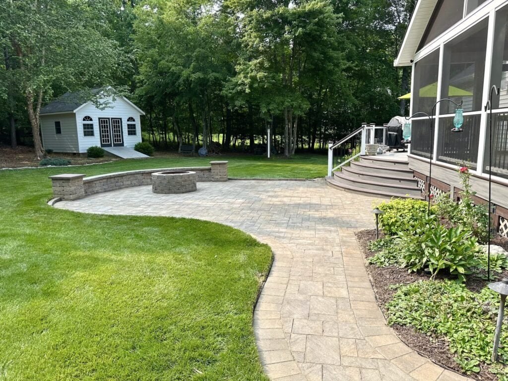 Residential backyard freshly sealed patio and deck area at a home in Hanover Virginia