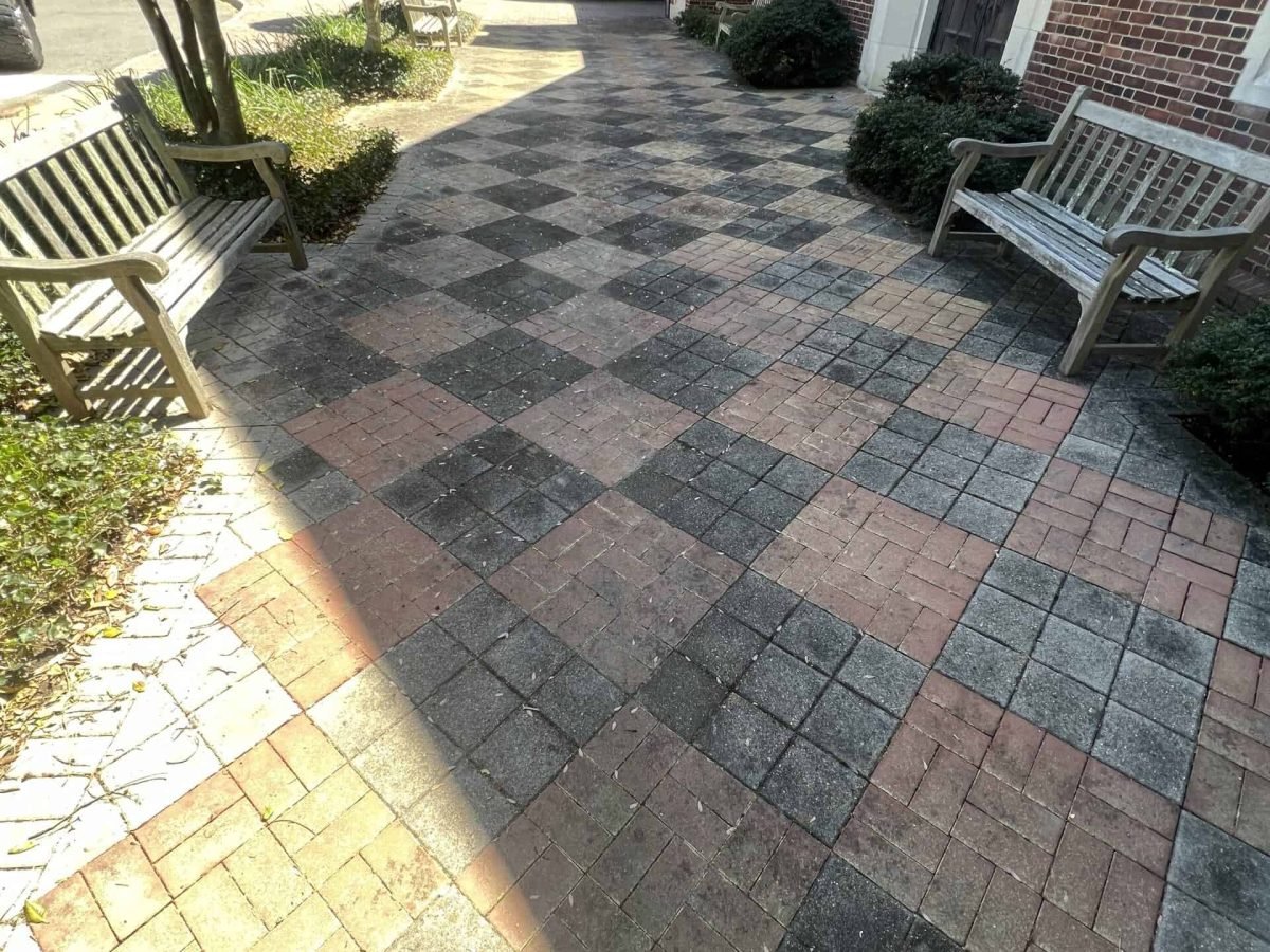 exterior brick and paver patio before professional power washing and cleaning by alpha exterior cleaning services at university of Richmond in virginia
