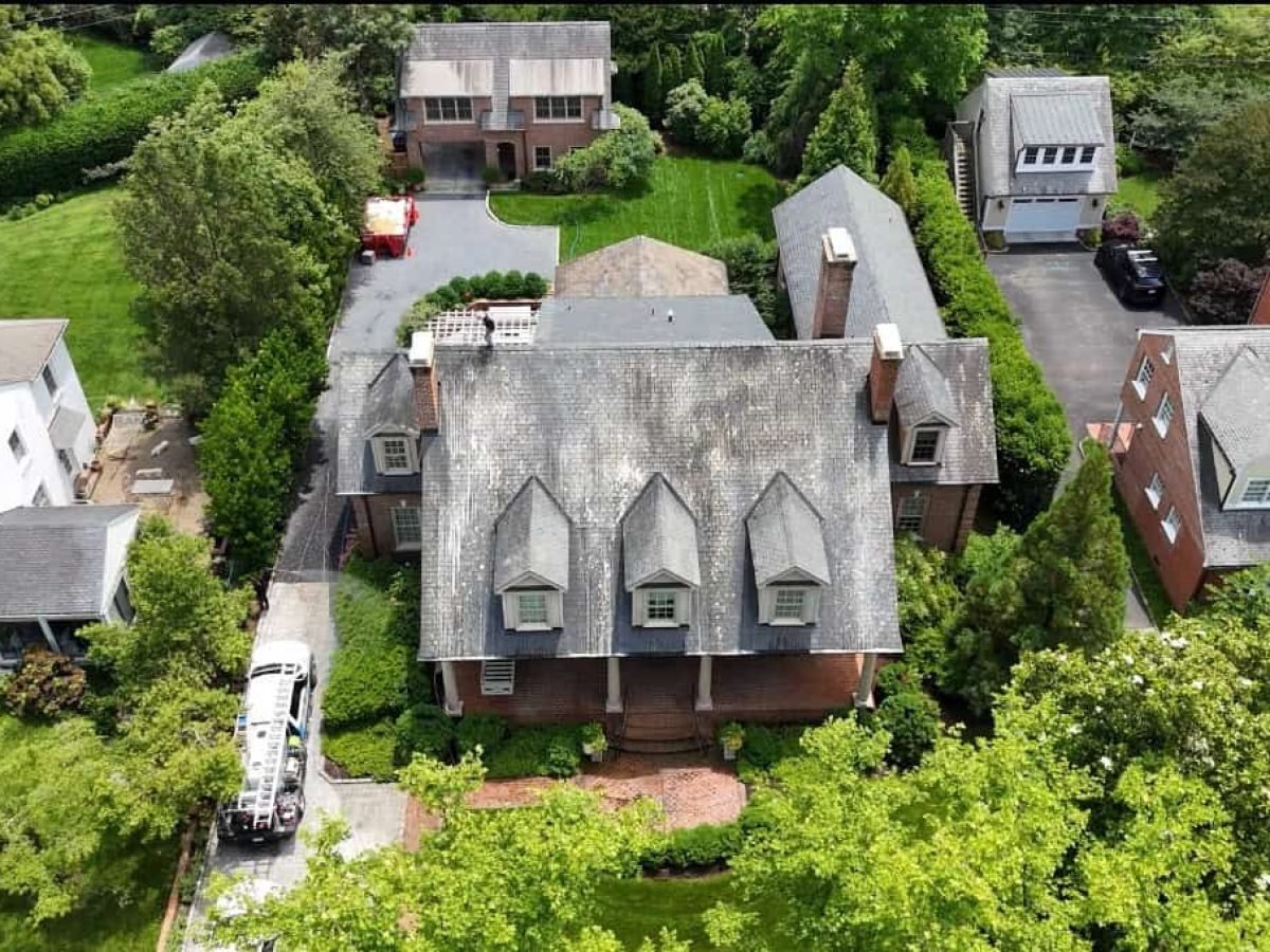 Drone view of residential home before cleaning by Alpha exterior solutions