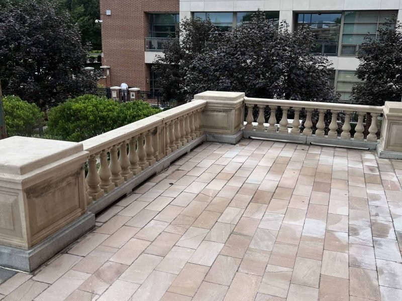 Commercial stone paver patio after cleaning by alpha exterior solutions