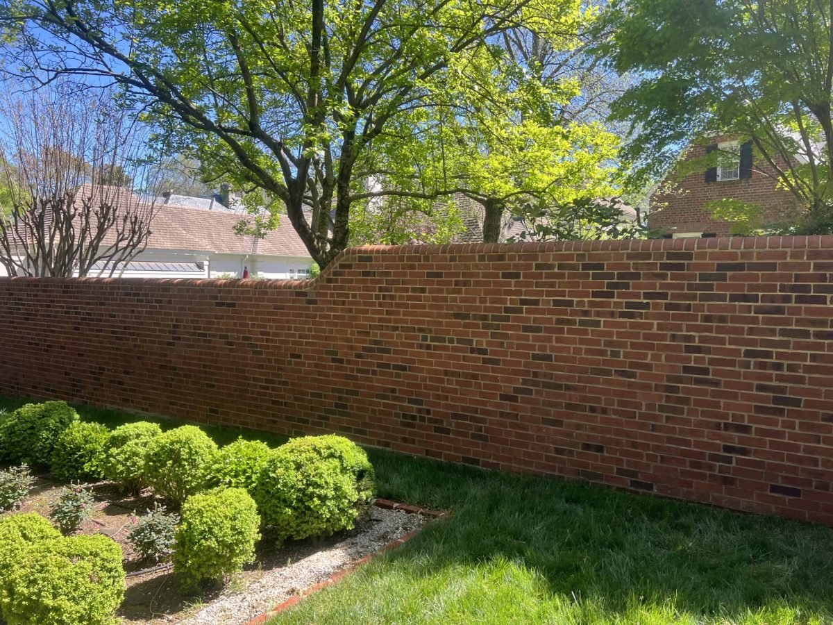 Cleaned brick retaining wall after professional pressure washing at a Powhatan Virginia home