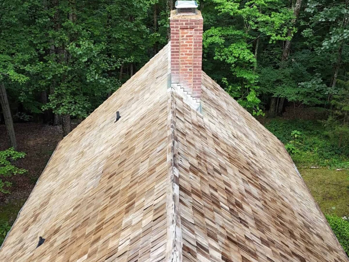 Drone view of residential home before cleaning by Alpha exterior solutions